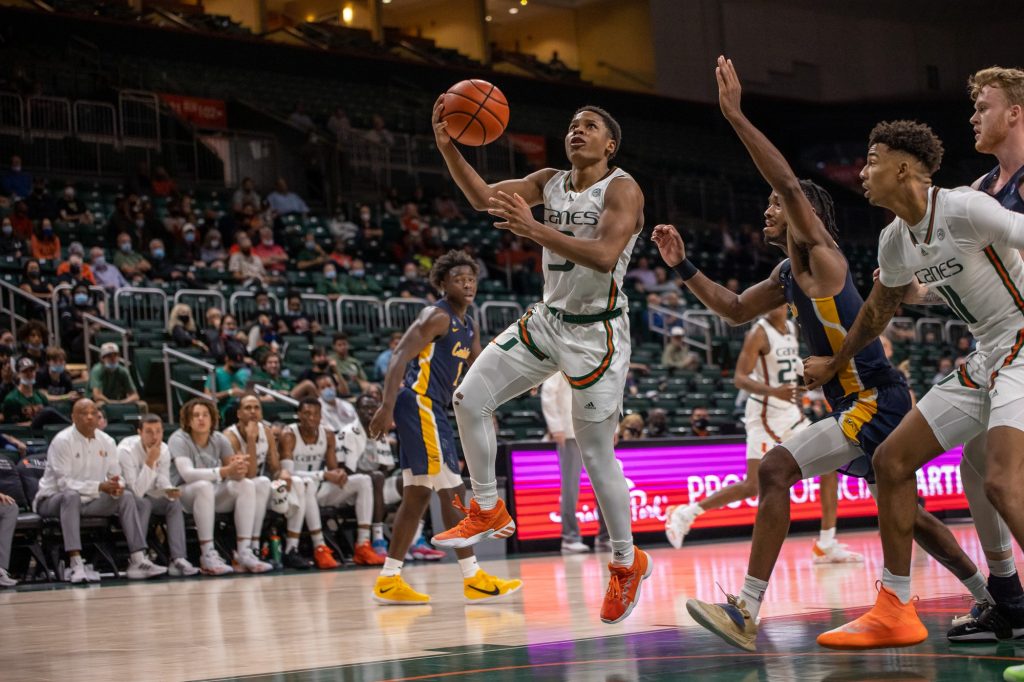 Sixth-year redshirt senior Charlie Moore attempts a layup during the second half of Miami’s win over Canisius on Nov. 9 at the Watsco Center. Moore finished the game with 13 points and four rebounds.