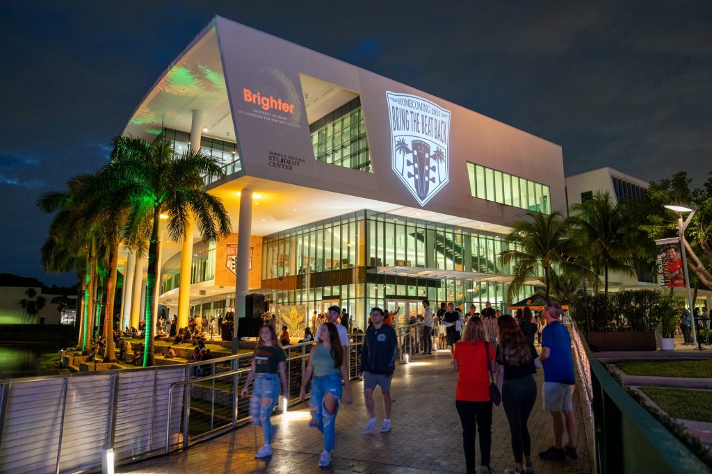 The “Bring the Beat Back” homecoming theme is projected onto the side of the Shalala Student Center during the homecoming festivities on Nov. 5, 2021.