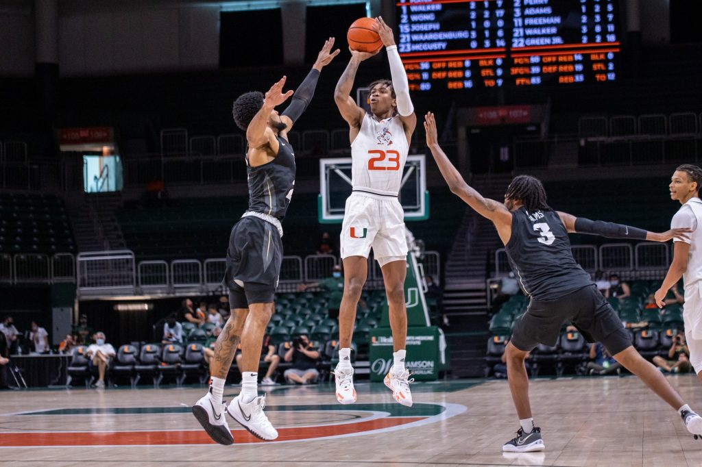 Sixth-year redshirt senior Kameron McGusty shoots a 3-point shot during Miami's game against UCF on Nov. 13 at the Watsco Center.
