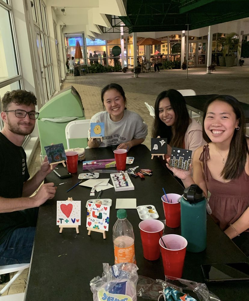 FACT members paint canvases based on their identity at the University of Miami Asian American Students Association's annual Lantern Festival.