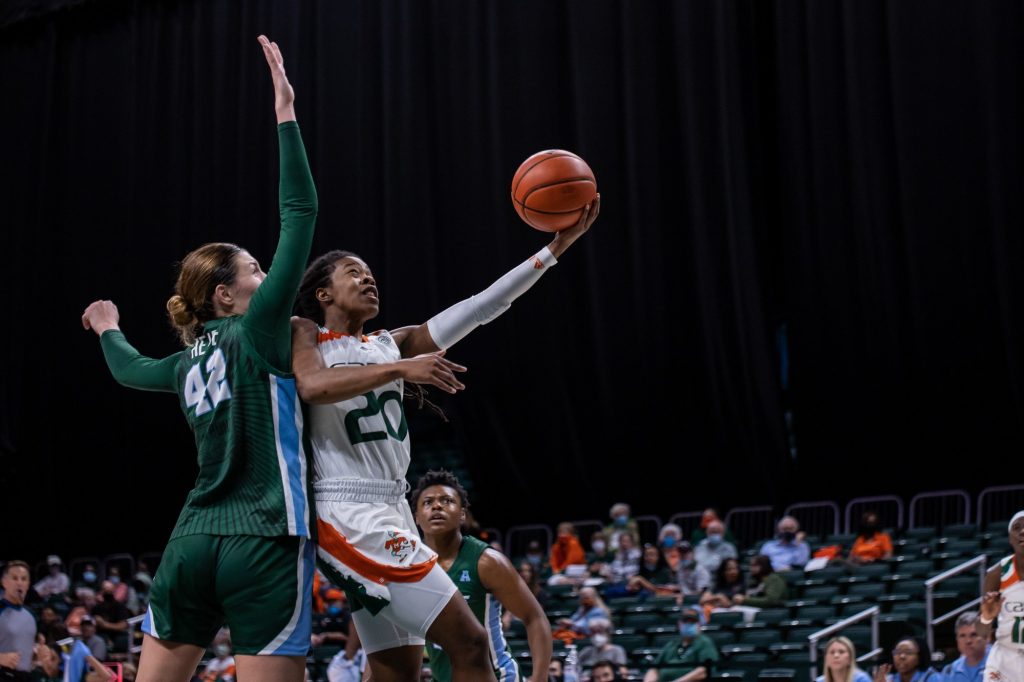 Graduate student Kelsey Marshall fights for a layup during the first half of Miami’s win over Tulane on Sunday, Dec. 5 at the Watsco Center. Marshall had a game high 19 points.