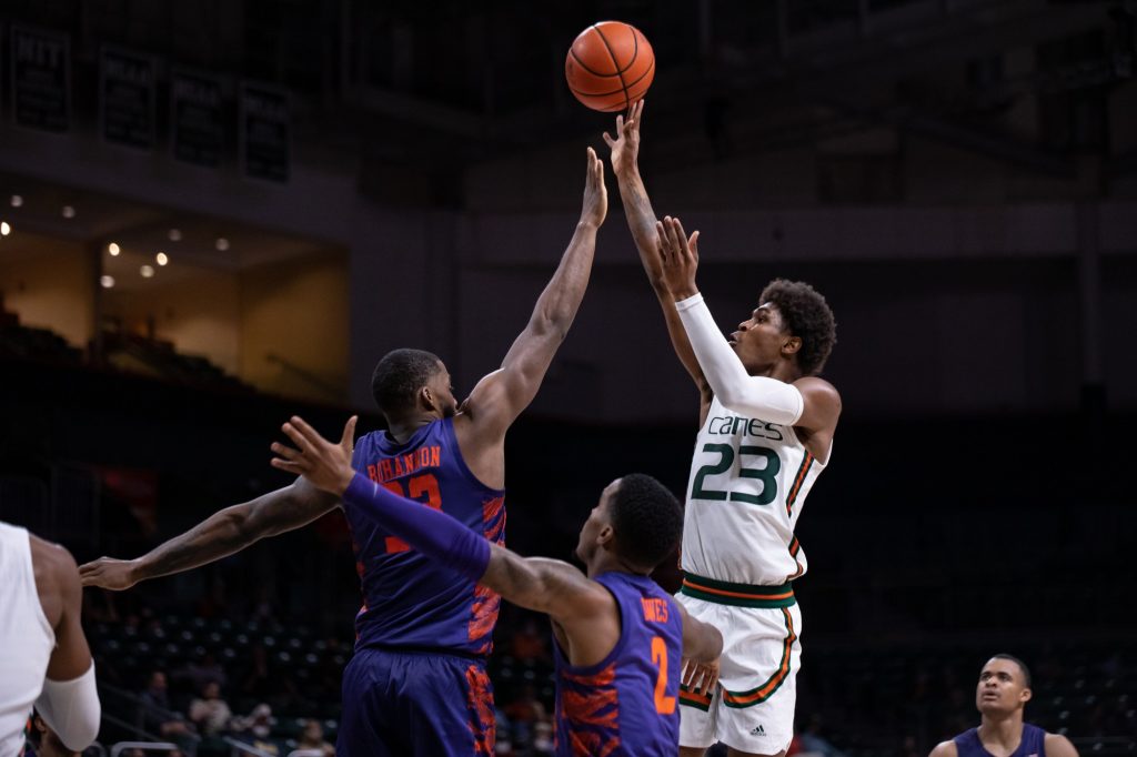 Sixth-year redshirt senior Kameron McGusty takes a shot from the key during the second half of Miami’s 80-75 win over Clemson on Saturday, Dec. 4 at the Watsco Center. McGusty finished the game with 15 points and helped Miami to their first conference game of the season.