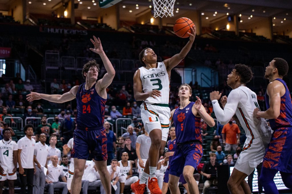 Sixth-year redshirt senior Charlie Moore goes up for a reverse layup that gave him two of his eight points during Miami’s win over Clemson 80-75 at the Watcso Center on Saturday Dec. 4.