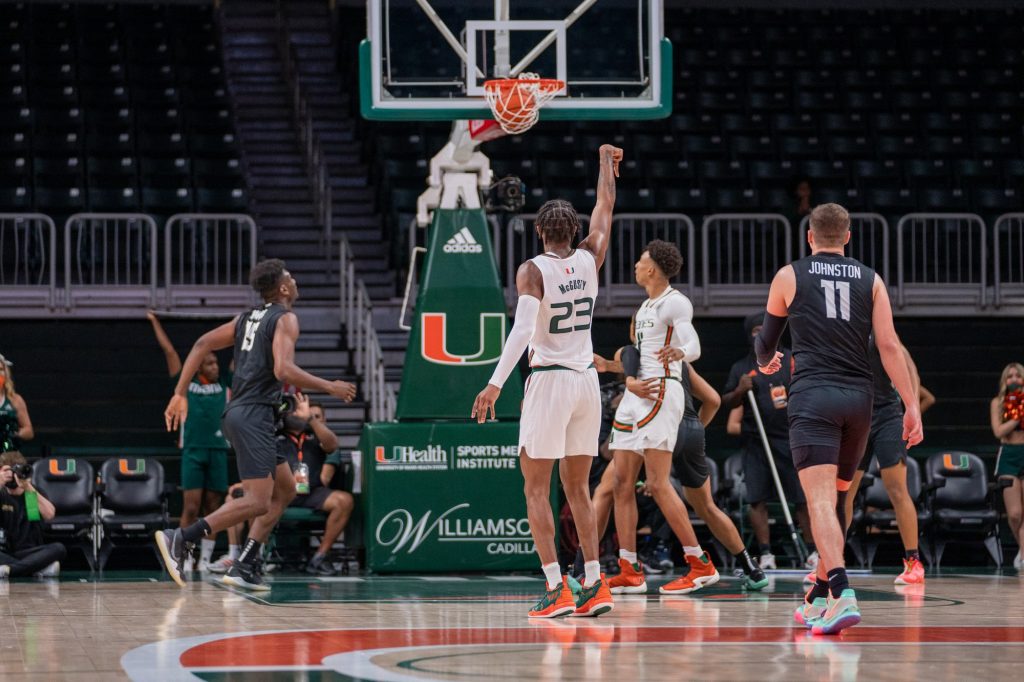 Redshirt senior guard Kameron McGusty makes a three-point shot during the second half of Miami’s game versus Stetson University in the Watsco Center on Dec. 20, 2021.