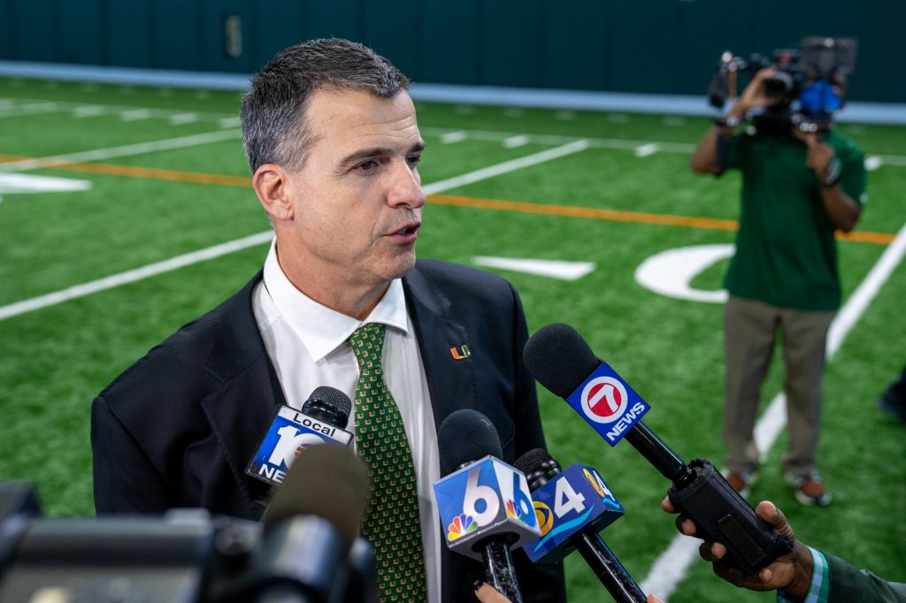 Head coach Mario Cristobal fields questions from local media after the conclusion of his introductory press conference in the Carol Soffer Indoor Practice Facility on Dec. 7, 2021.