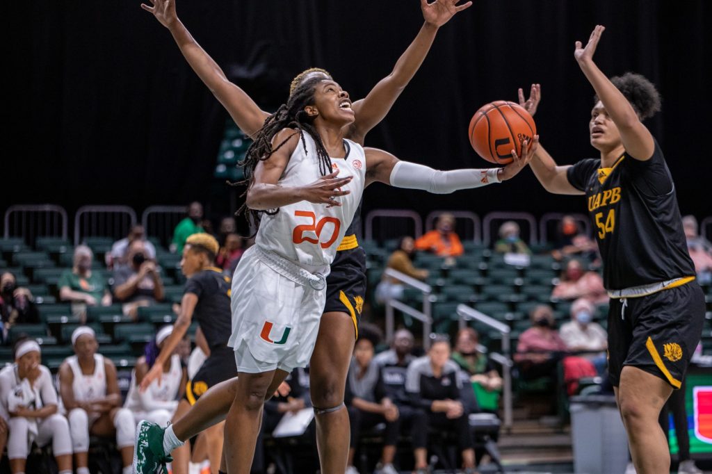 Graduate Student Kelsey Marshall attempts a reverse layup as a part of her 19 points in Miami’s dominant win over Arkansas-Pine Bluff on Monday, Dec. 6 at the Watsco Center.