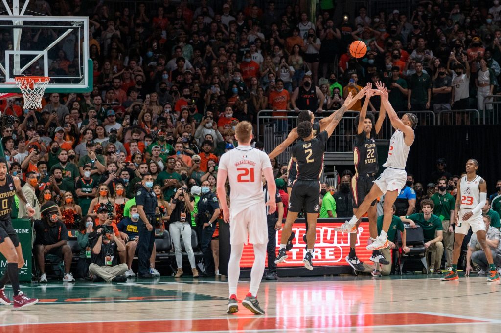 Third-year sophomore guard Isaiah Wong shoots a fade-away as time expires in the second half of Miami’s game versus Florida State in the Watsco Center on Jan. 22, 2022. Wong did not score, and the Seminoles won 61-60.