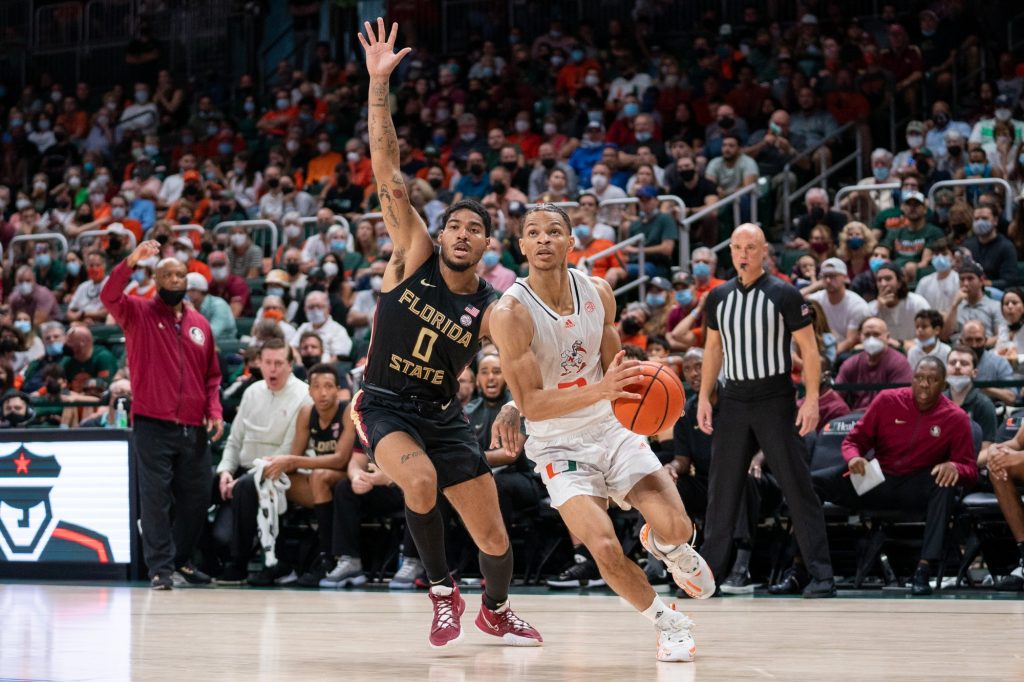 Third-year sophomore guard Isaiah Wong drives to the basket during the first half of Miami’s game versus Florida State in the Watsco Center on Jan. 22, 2022.