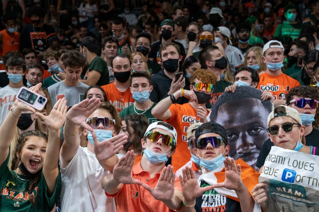 Canes fans throw up the U before the start of Miami’s game versus Florida State in the Watsco Center on Jan. 22, 2022.