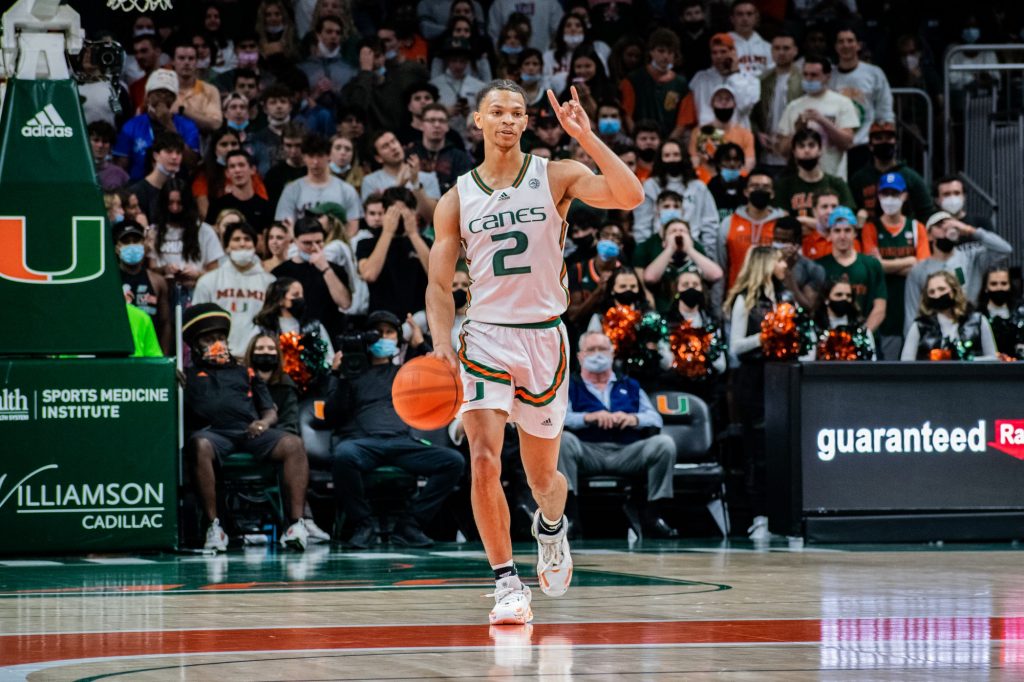 Third-year sophomore guard Isaiah Wong dribbles up the court and signals a play call in Miami's win over North Carolina on Tuesday, Jan. 18 at the Watsco Center.