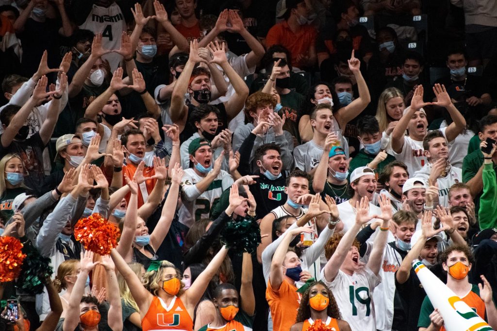 Miami students throw up the "U" in the Watsco Center&squot;s student section, "The Eye," during the Hurricanes&squot; wire-to-wire victory over the North Carolina Tar Heels on Tuesday, Jan. 18.