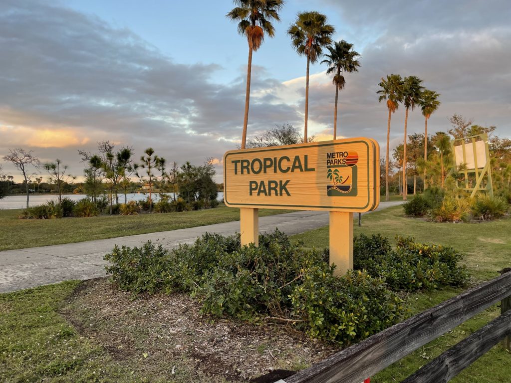 The sun sets over the Miller Drive entrance at Tropical Park on Feb. 13, a long standing favorite for Miami-Dade residents.