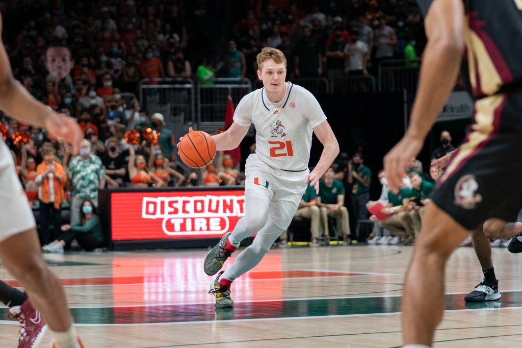 Sixth-year redshirt senior forward Sam Waardenburg brings the ball downcourt during the first half of Miami’s game versus Florida State in the Watsco Center on Jan. 22, 2022.