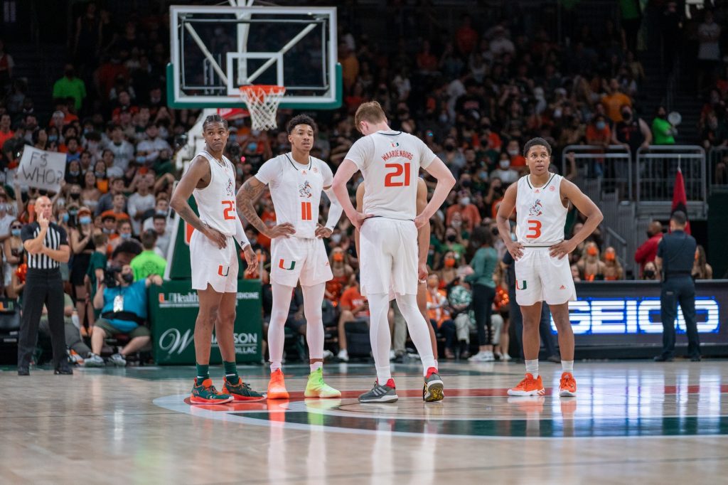 Guard Kameron McGusty, Jordan Miller, Sam Waardenburg, and Charlie Moore wait during the second half of Miami’s game versus Florida State in the Watsco Center on Jan. 22, 2022.