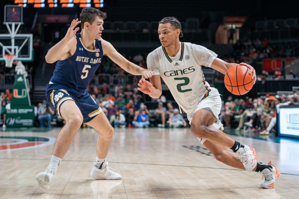 Third-year sophomore guard Isaiah Wong drives to the basket during the second half of Miami’s game versus Notre Dame in The Watsco Center on Feb. 2, 2022.