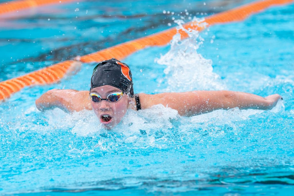 Senior Aino Otava competes in the 200 yard butterfly to start the Miami First Chance Invite at the Norman Whitten Pool on Feb. 11, 2022. Otava finished with a time of 1:57.24, setting a new school record.