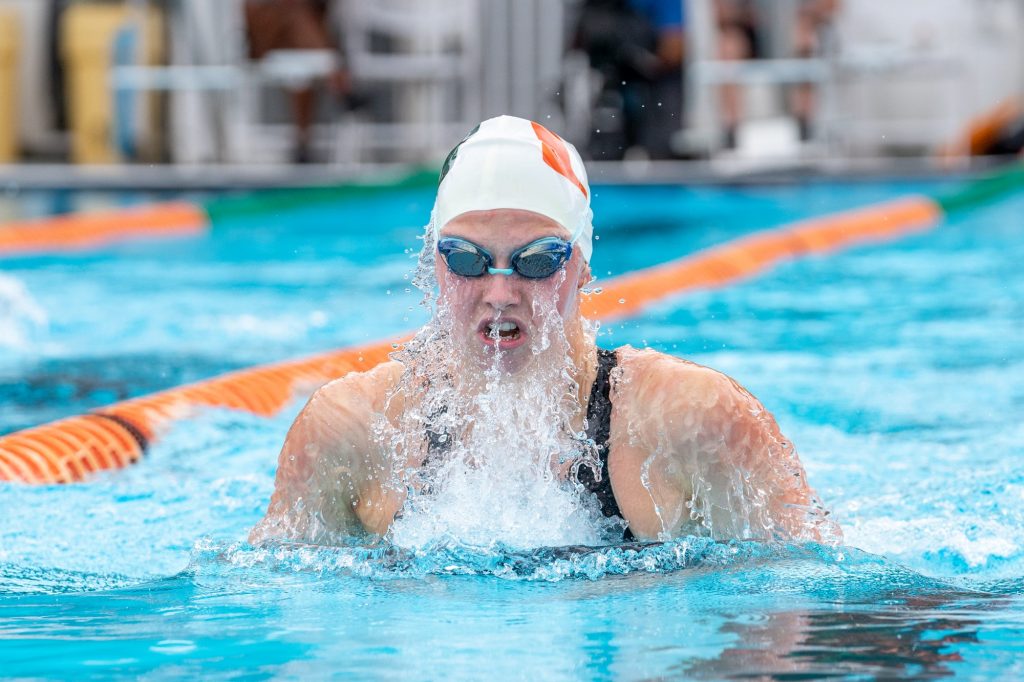 Sophomore Emma Sundstrand competes in the 100 yard breaststroke at the Miami First Chance Invite at the Norman Whitten Pool on Feb. 11, 2022. Sundstrand made the NCAA B cut and ACC top 20 with a time of 1:00.77.