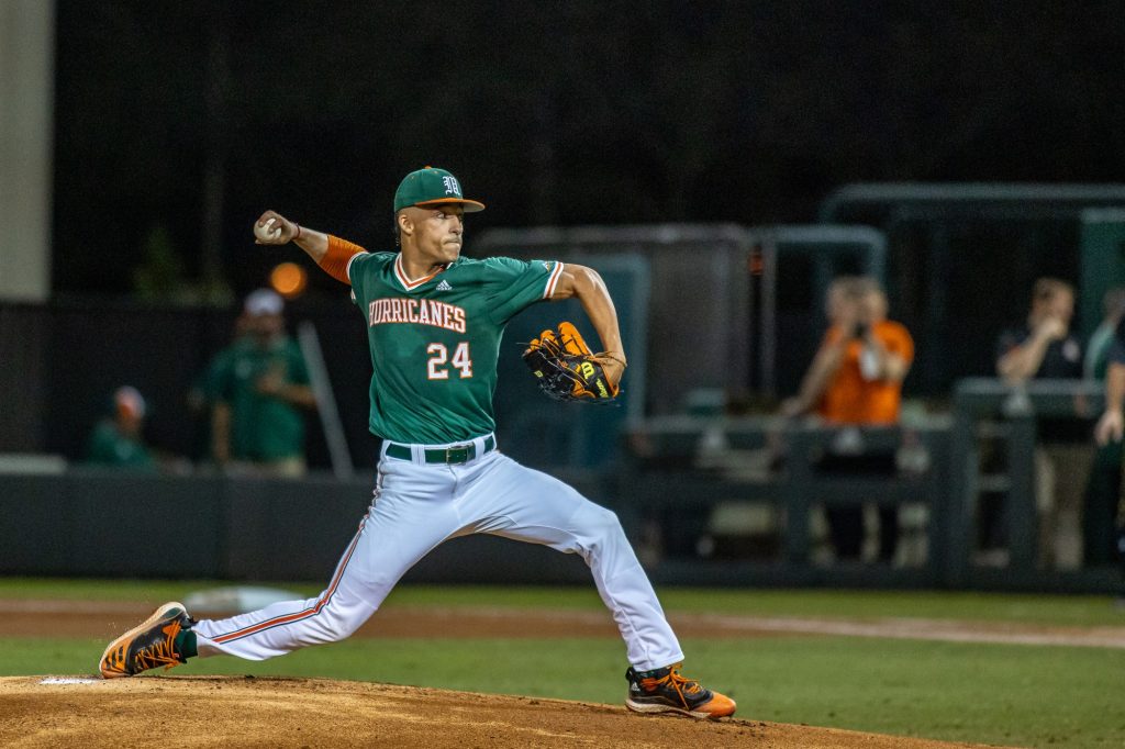 Sophomore pitcher Alejandro Rosario throws a pitch during the third inning of Miami's 10-8 win over Towson at Mark Light Field on Friday, Feb. 18. Rosario threw five innings while recording five strikeouts and five earned runs.