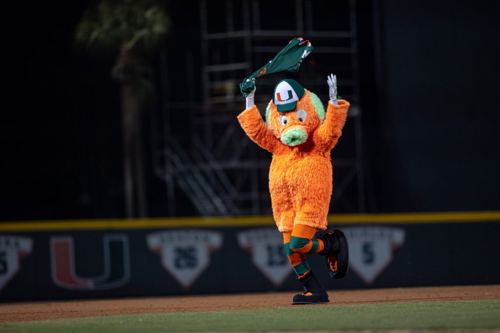 The Miami Maniac runs around the field after Miami's opening night win over Towson at Mark Light Field on Friday, Feb. 18, 2022.