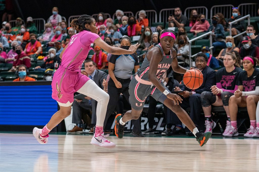 Freshman guard Ja’Leah Williams drives to the basket during the first quarter of Miami’s game versus Florida State in The Watsco Center on Feb. 13, 2022.