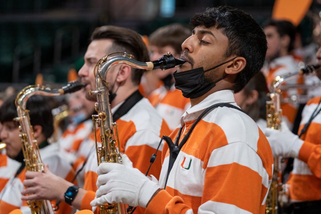The Frost Band of the Hour plays the Alma Matter after Miami defeated Florida State 76-59 in The Watsco Center on Feb. 13, 2022.