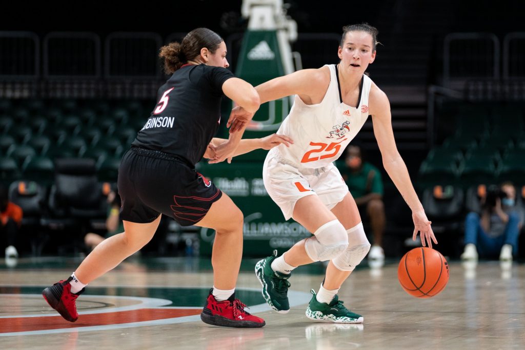 Senior guard Karla Erjavec drives downcourt during the fourth quarter of Miami’s game versus Louisville in The Watsco Center on Feb. 1, 2022. The Canes lost to the Cardinals 66-69.