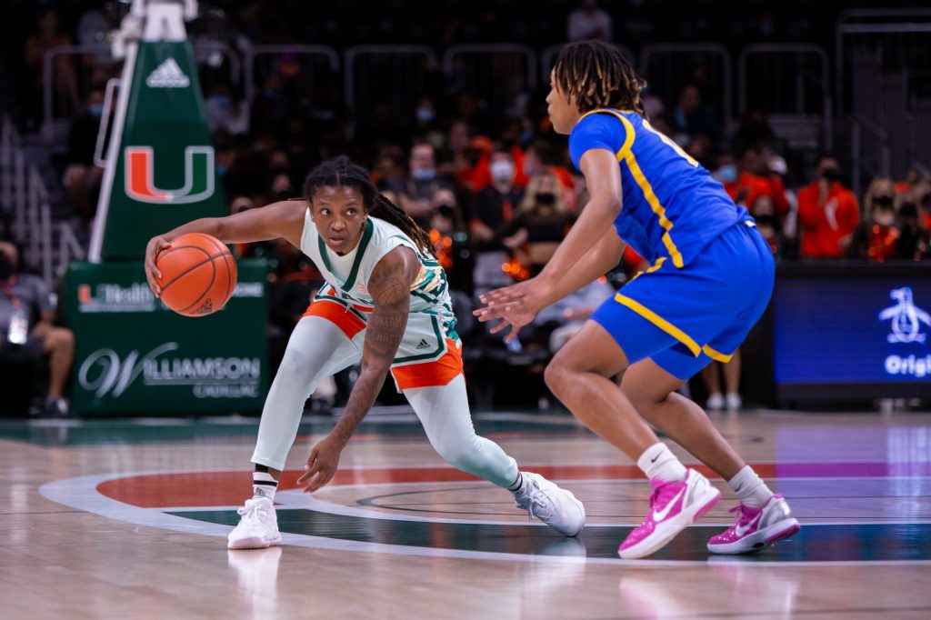 Senior guard Mykea Gray does a crossover in front of a Panthers defender during the first quarter of Miami's game versus Pittsburgh in The Watsco Center on Feb. 17, 2022.