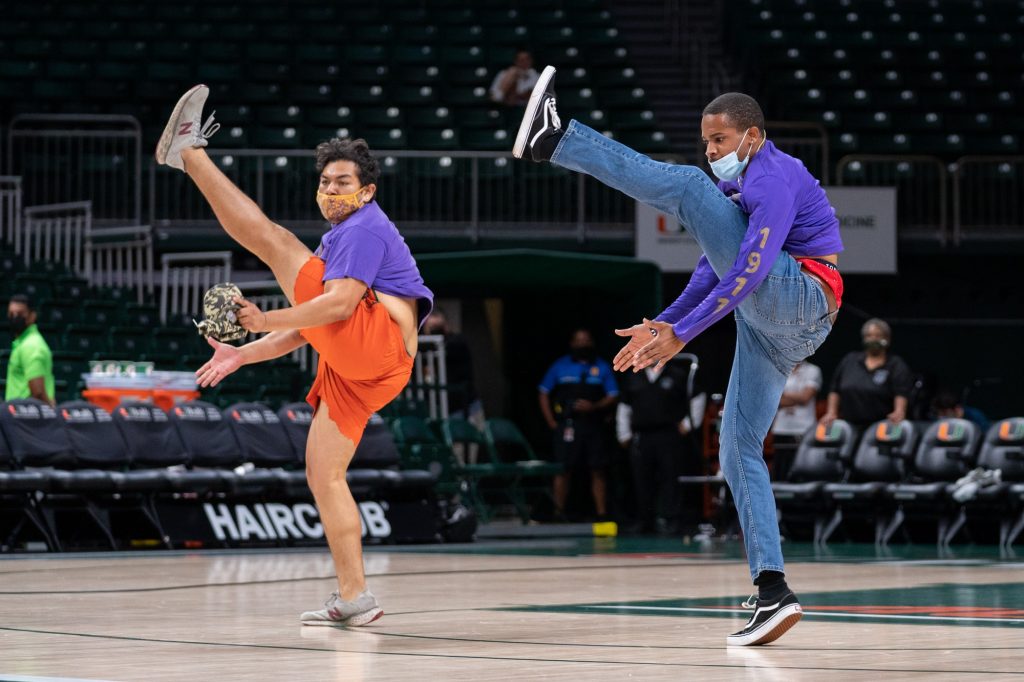 Members of the Omega Psi Phi Fraternity perform at halftime of Miami’s game versus Pittsburgh in The Watsco Center on Feb. 17, 2022.