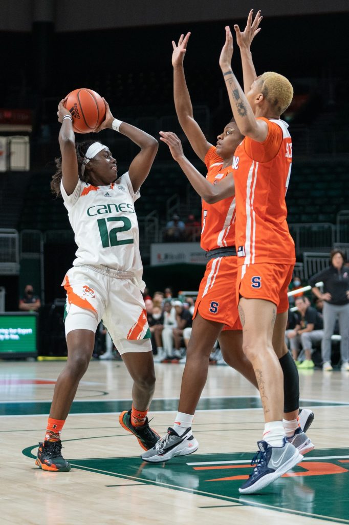 Freshman guard Ja’Leah Williams looks for an open teammate during the first quarter of Miami’s game versus Syracuse in The Watsco Center on Feb. 3, 2022.