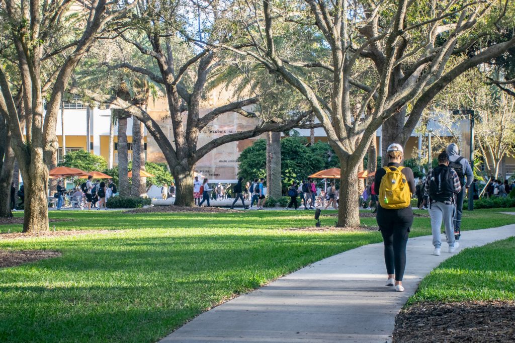 Students traverse the University of Miami's Coral Gables campus, where opinions on upcoming changes to the SAT exam are largely supportive.