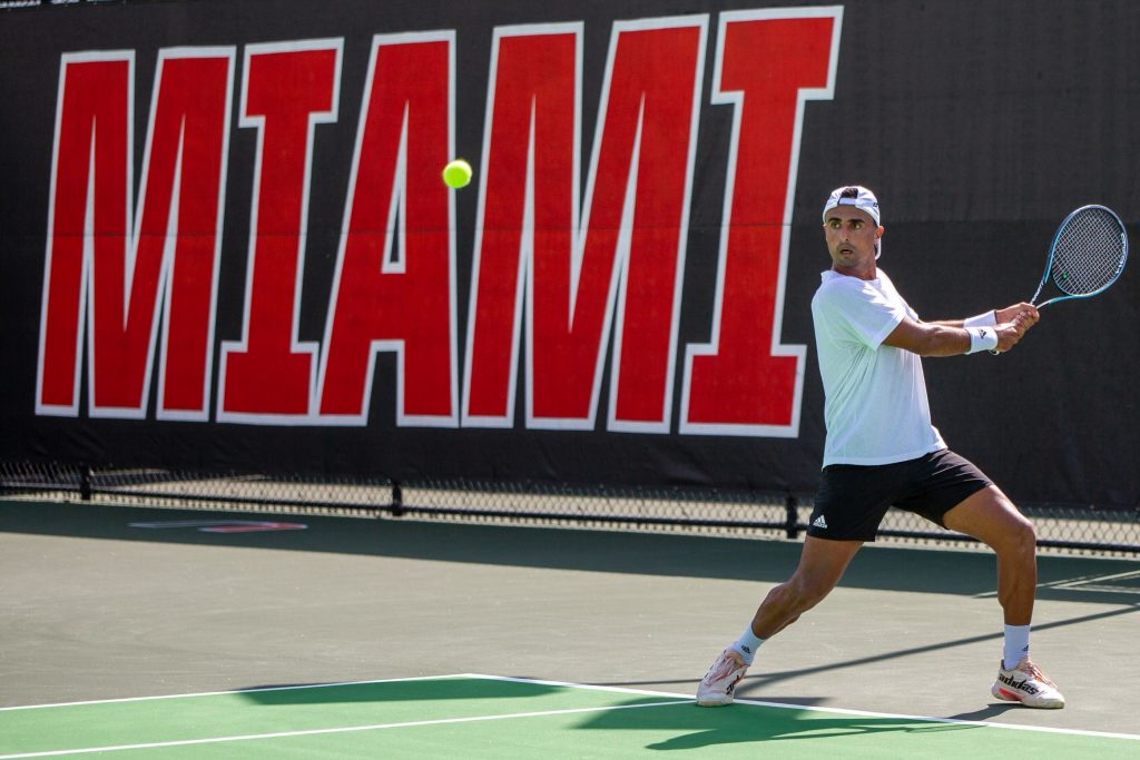 Fourth Year Junior Juan Martin Jalif shot a backhand during doubles matches against Georgia State on Feb 18. at the Neil Schiff Tennis Center in Coral Gables.