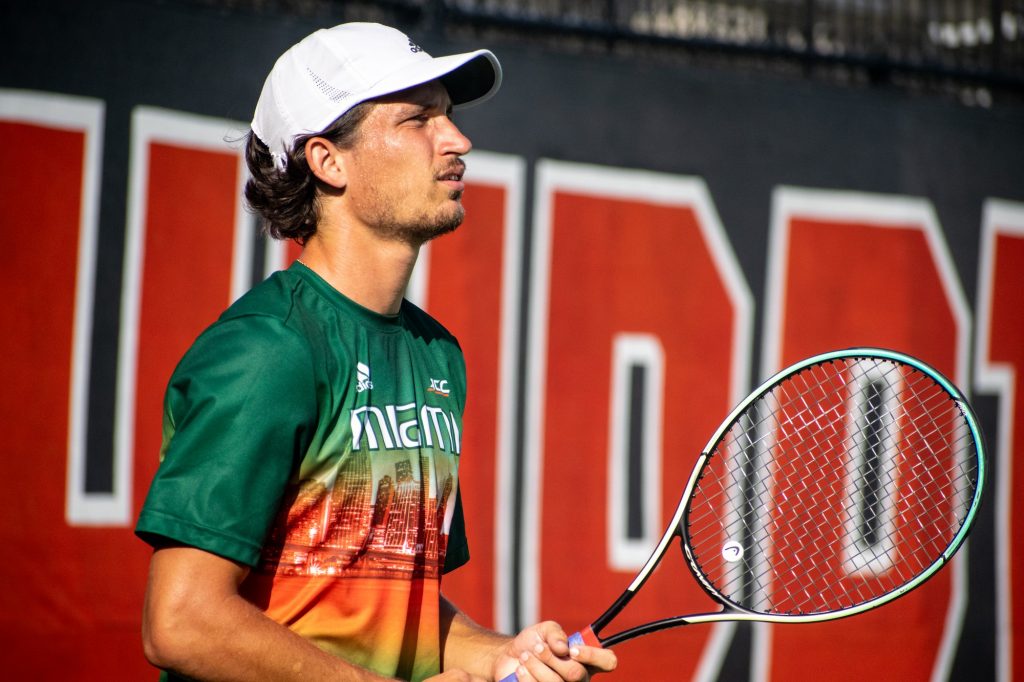 Fifth-year senior Benjamin Hannestad prepares for a doubles rally against Army on Wednesday, March 9, 2022 at the Neil Schiff Tennis Center.