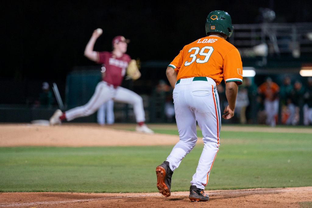 Sophomore outfielder Jacoby Long inches toward home plate in the bottom of the fourth inning of Miami’s game versus Boston College at Mark Light Field on March. 12, 2022.