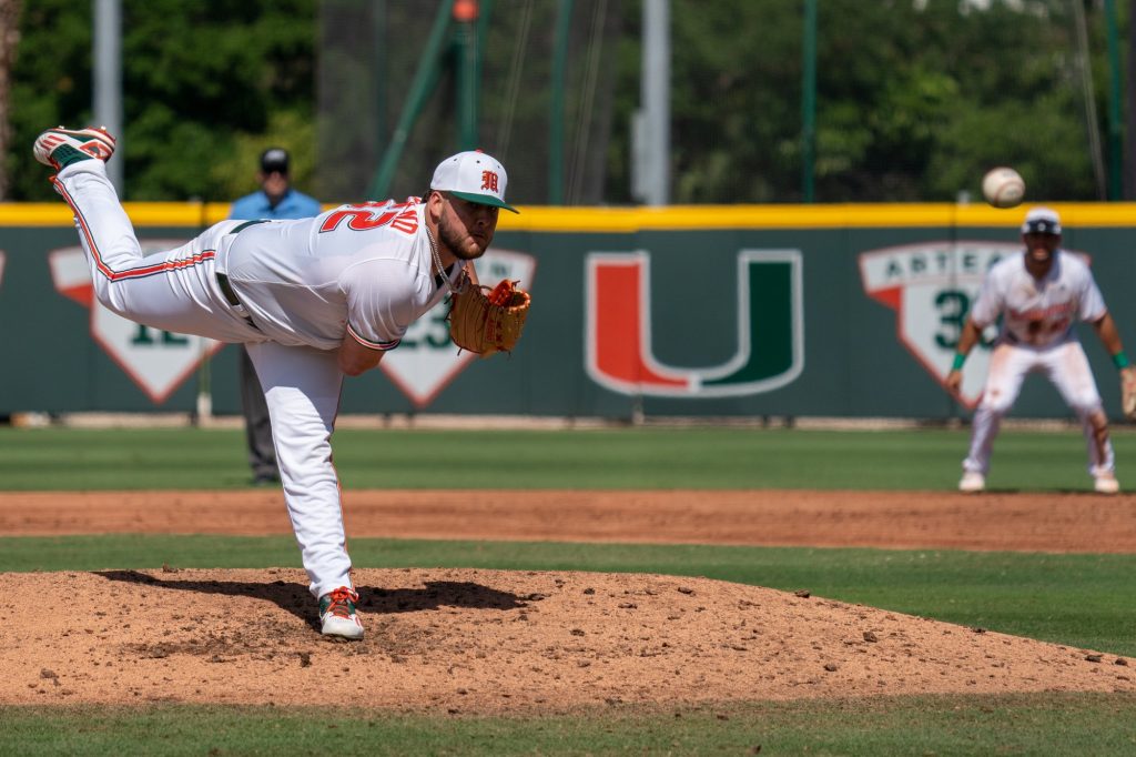 Sophomore pitcher Jake Garland pitches at the top of the third inning of Miami’s game versus Harvard at Mark Light Field on Feb. 28, 2022.