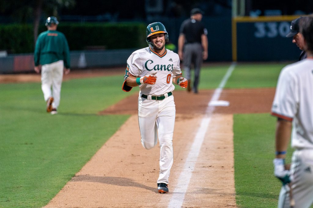 Freshman infielder Dorian Gonzalez Jr. heads to home plate after hitting a home run in the bottom of the second inning of Miami’s game versus the University of North Carolina at Chapel Hill at Mark Light Field on March. 25, 2022.