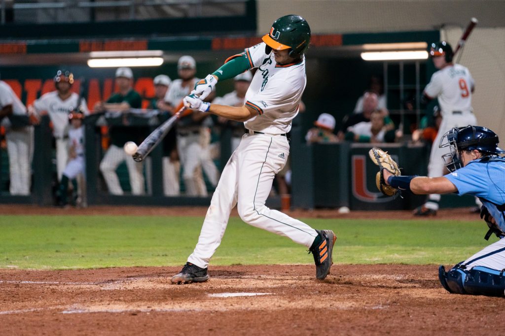 Sophomore infielder Dominic Pitelli hits in the bottom of the third inning of Miami’s game versus the University of North Carolina at Chapel Hill at Mark Light Field on March. 25, 2022.