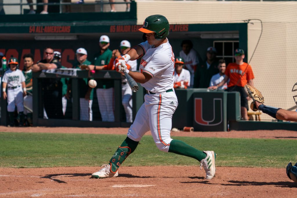 Freshman outfield/infielder Renzo Gonzalez hits in the bottom of the ninth inning of Miami’s game versus the University of North Carolina at Chapel Hill at Mark Light Field on March 27, 2022.