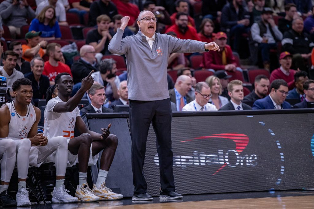 Head coach Jim Larrañaga calls out a play to Miami players while on offense against Iowa State on Friday, March 26, 2022 at the United Center in Chicago, Illinois.