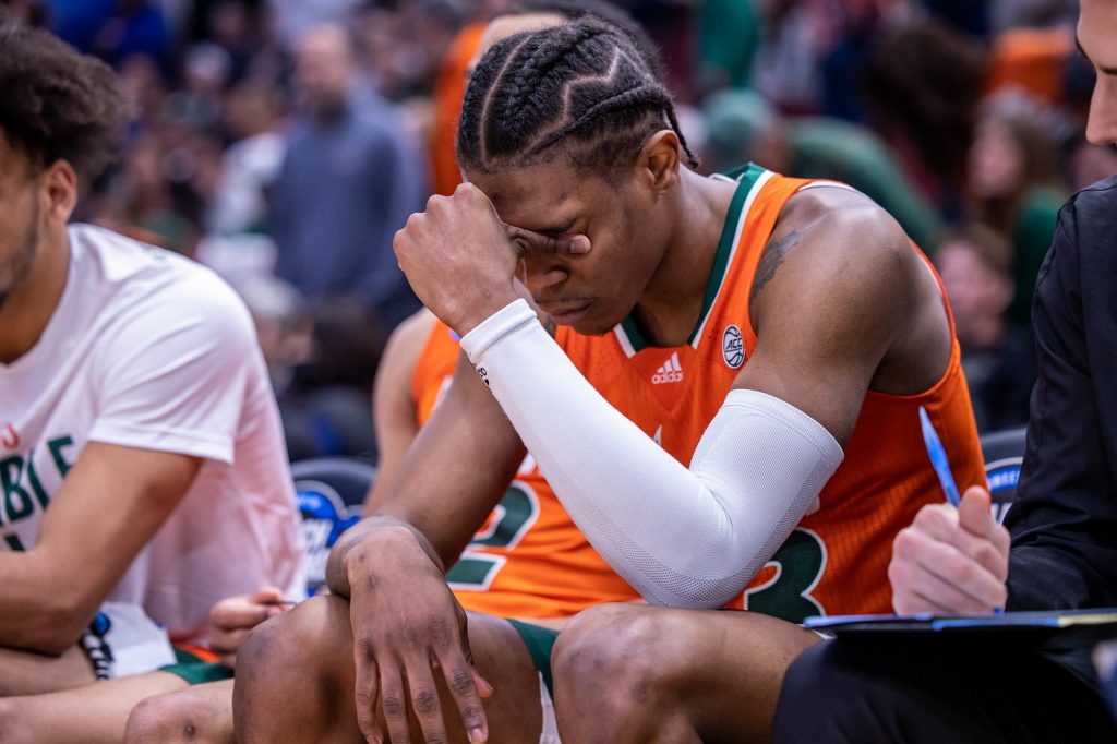 Sixth-year redshirt senior Kameron McGusty laments late in the second half of Miami's loss to Kansas in the Elite Eight of the NCAA Tournament at the United Center in Chicago on Sunday, March 27, 2022. Despite the loss, McGusty scored 18 points and secured a spot on the Midwest All-Region Team.