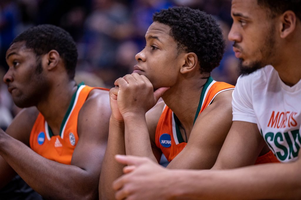 Sixth-year redshirt senior guard Charlie Moore looks on in the second half of Miami's 76-50 loss to top-seeded Kansas in the Elite Eight on Sunday, March 27, 2022 at the United Center in Chicago.