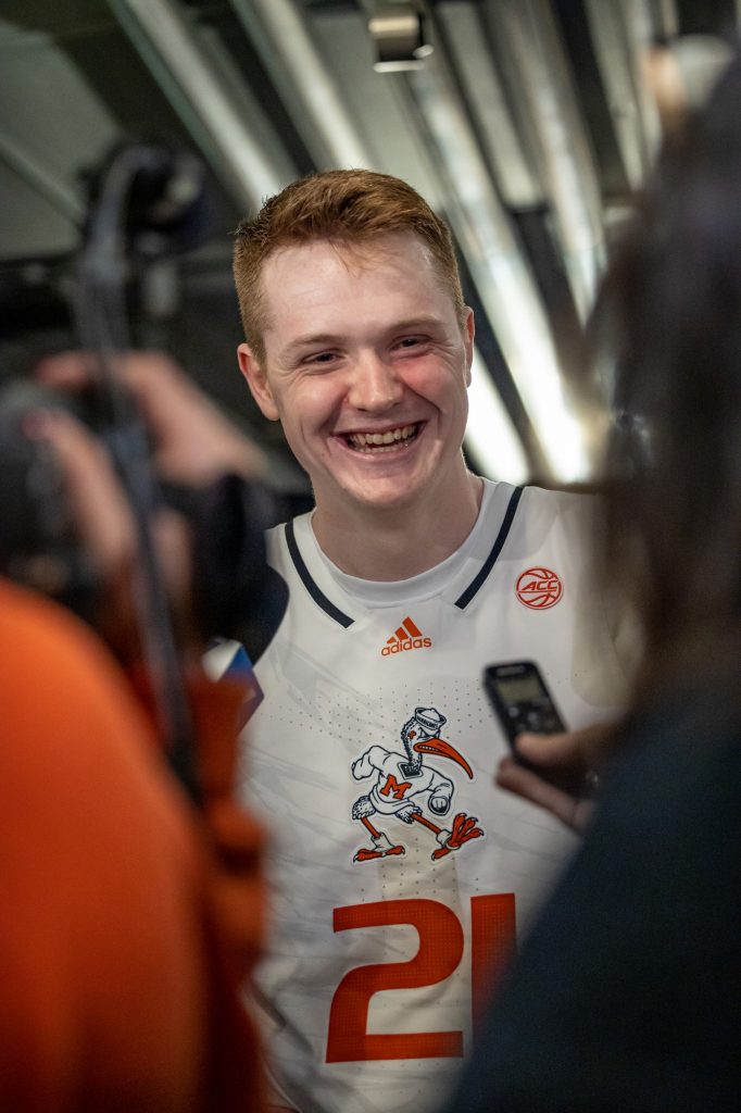 Sixth-year redshirt senior Sam Waardenburg smiles while talking to local media following Miami's win over Iowa State in the Sweet 16 at the United Center in Chicago on Friday, March 25, 2022.