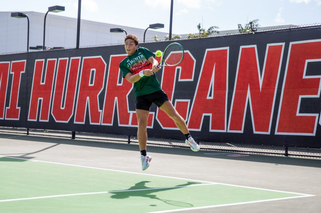 Fourth-year junior Franco Aubone warms up for his matches against FAU at the Neil Schiff Tennis Center on Feb. 25, 2022.