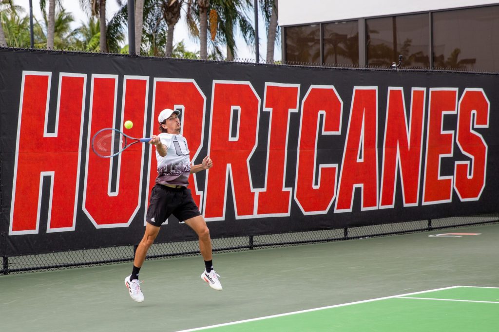 Fifth-year senior Benjamin Hannestad Returns the ball during his singles match against the FAU at the Neil Schiff Tennis Center on Feb.  25, 2022.