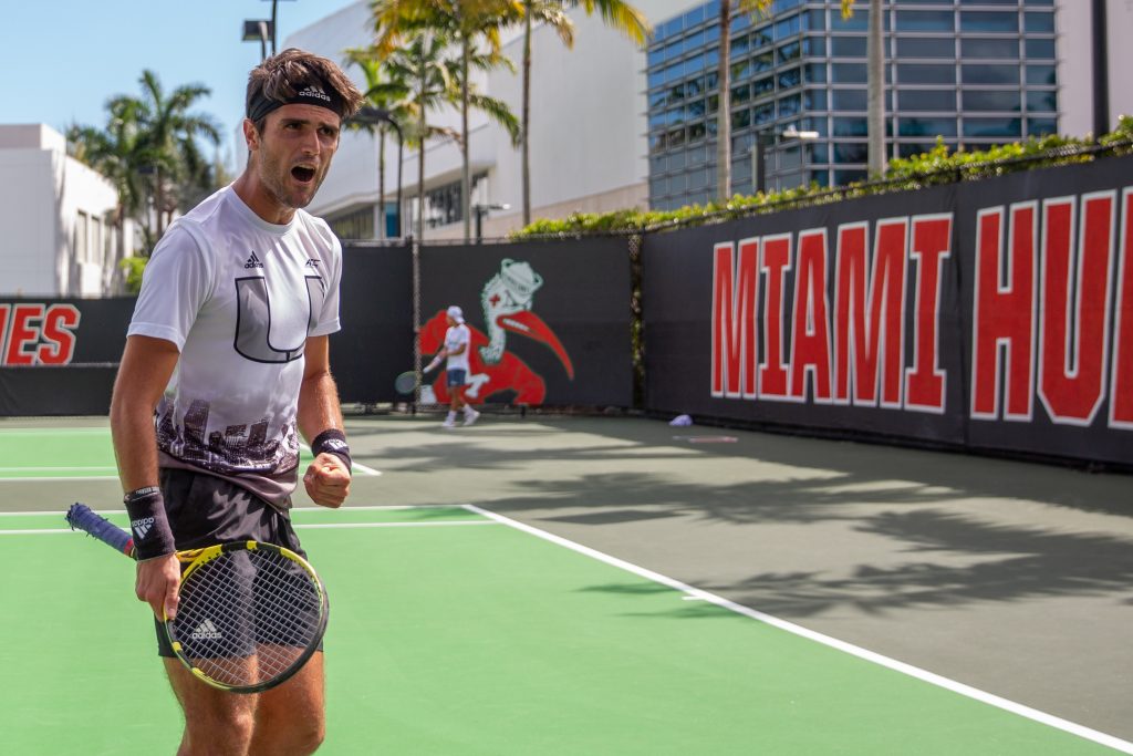 Fifth-year senior Bojan Jankulolvski celebrates after a point during a singles match against FAU at the Neil Schiff Tennis Center on Feb. 25, 2022.