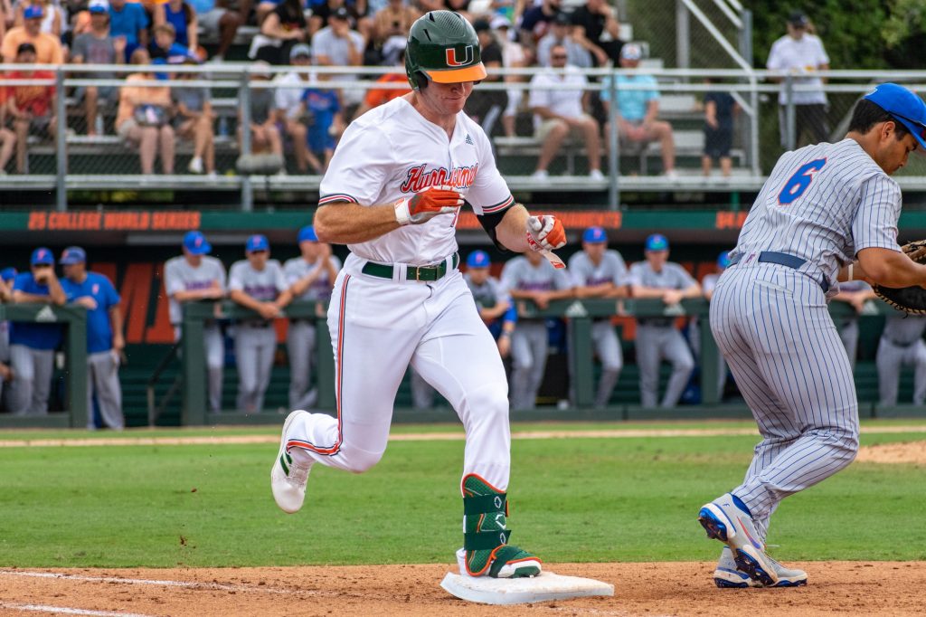 Freshman outfielder Zach Levenson runs to first base during Miami's rubber game against Florida on Sunday, March 6, 2022 at Mark Light Field.