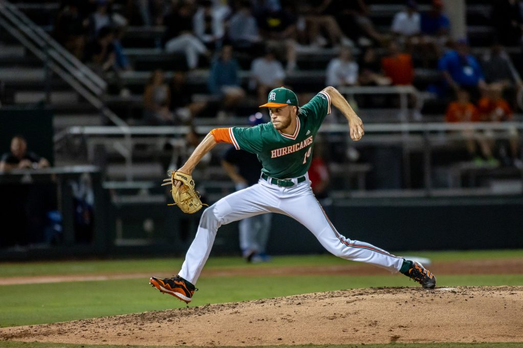 Sophomore starting pitcher Carson Palmquist throws a pitch during the third inning of Miami's 5-2 win over Florida on Friday, March 4, 2022 at Mark Light Field. In 6 1/3 innings pitched, Palmquist totaled a career-high 11 strikeouts and allowed only three hits.