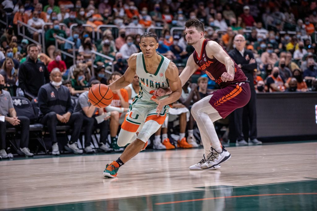Third-year sophomore Isaiah Wong drives past Virginia Tech's Hunter Cattoor on Saturday, Feb. 26, 2022 at the Watsco Center. Wong scored 13 points and added three rebounds and three assists in Miami's 71-70 loss.