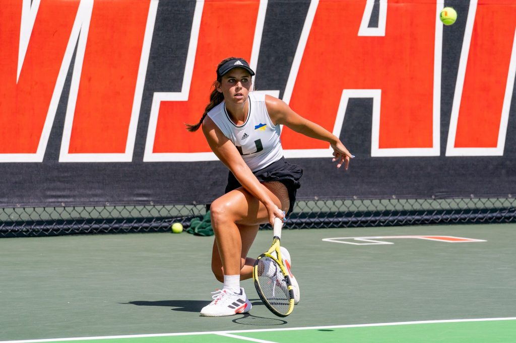 Sophomore Audrey Boch-Collins Returns the ball during the fourth game of her singles match versus Clemson sophomore Daniella Medvedeva at the Neil Schiff Tennis Center on Feb.  27, 2022.