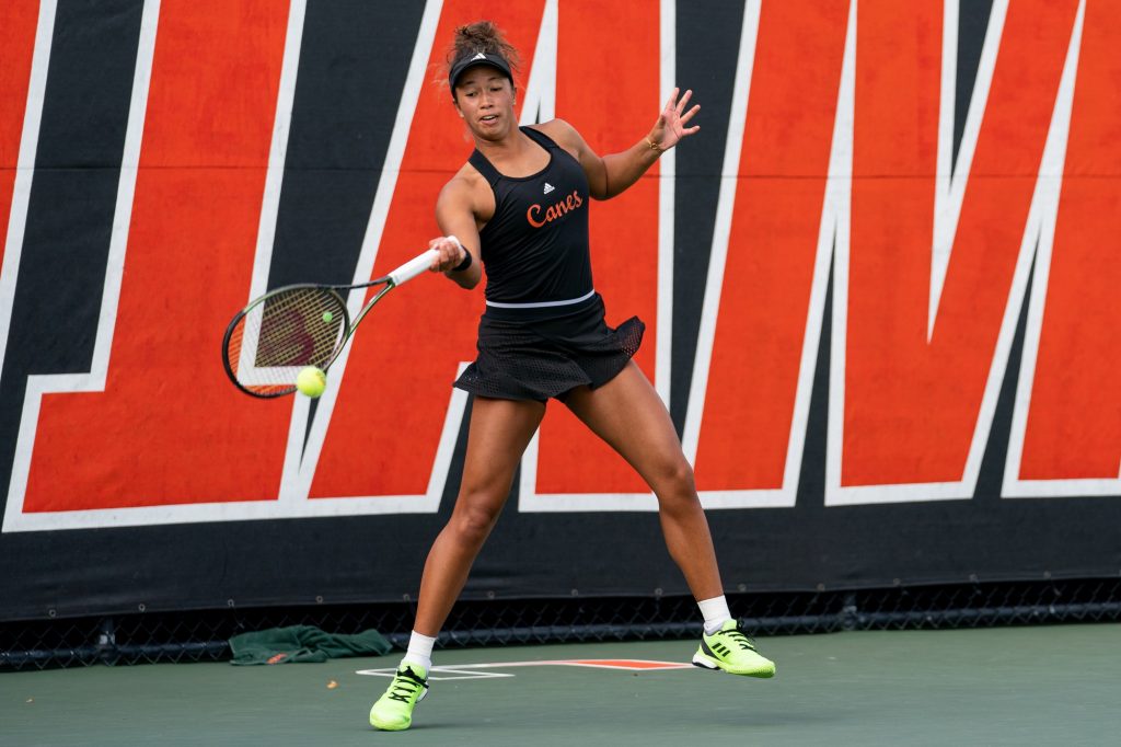 Fourth-year junior Daevenia Achong returns the ball during her and fifth-year senior Eden Richardson’s doubles match versus sophomore Fiona Crawley and Elizabeth Scotty of the University of North Carolina at Chapel Hill at the Neil Schiff Tennis Center on March 25, 2022.