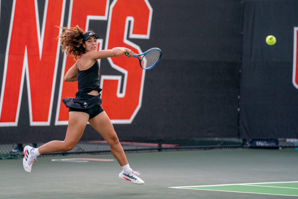 Third-year sophomore Maya Tahan returns the ball during the eighth game of her and doubles partner third-year sophomore Diana Khodan’s match versus senior Cameron Morra and senior Alle Sanford of the University of North Carolina at Chapel Hill at the Neil Schiff Tennis Center on March 25, 2022.